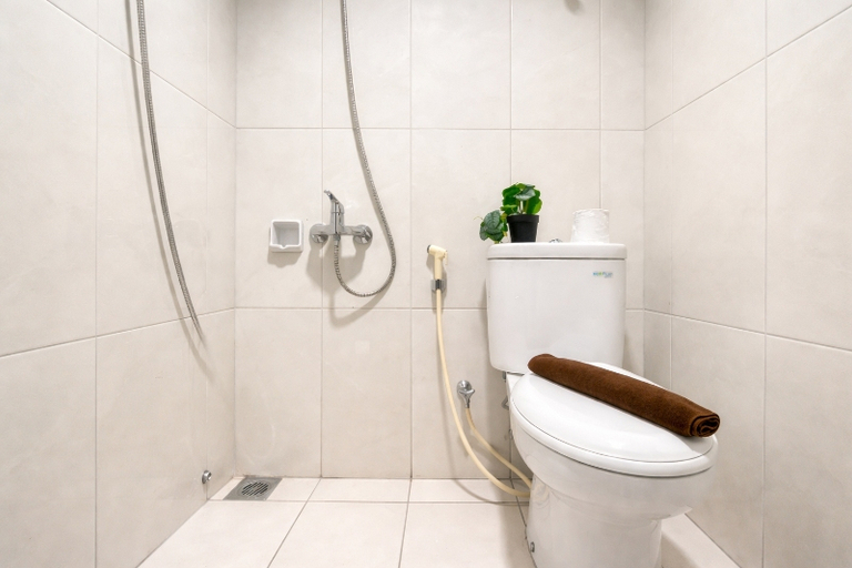 Bathroom 5, Airy and Comfortable 2BR at Nifarro Park Apartment By Travelio, Jakarta Selatan