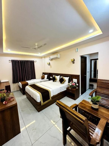Bedroom 3, Navarathna Comforts, Kodagu