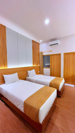 The Royal Trihadi Boutique Hotel Room Type - Royal Executive Twin Bed