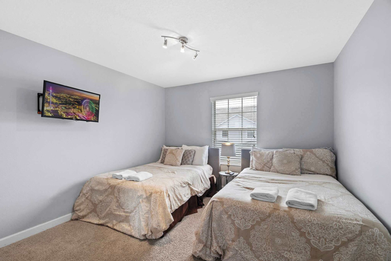 Room 3, Spacious 4BR Townhome With Pool at Storey Lake, Osceola
