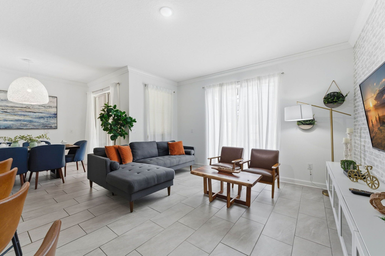 Living area 4, Chic 4BR Disney Retreat With Pool, Mickey Rooms, Osceola