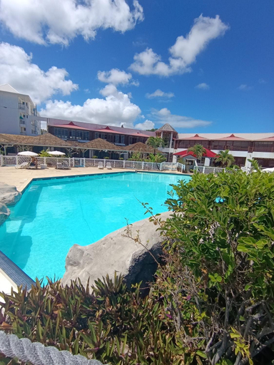 Sport & Beauty, Une vague de plaisir, Studio tout confort en bord de plage avec piscine a Saint-Francois, Saint-François