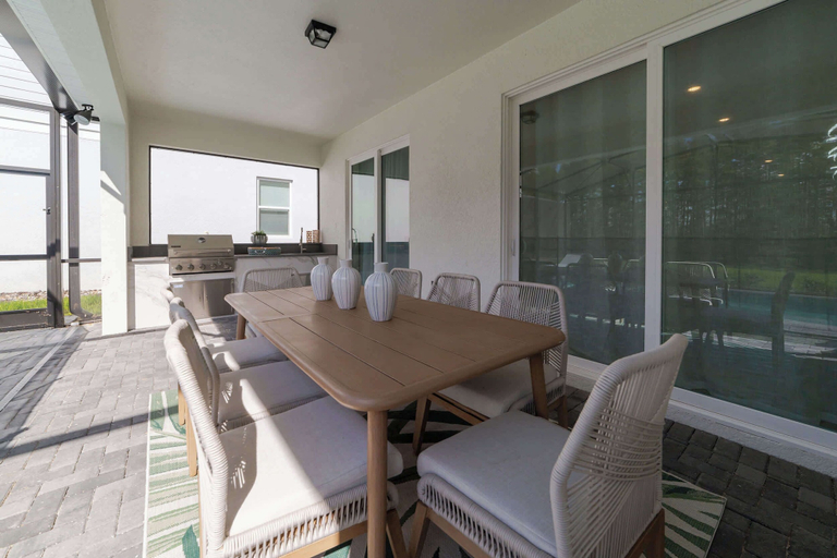 Outdoor banquet area, Funtastic Themed 5BR Home, Pool & Game Room, Lake