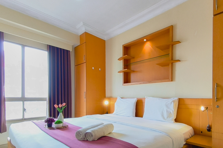 Bedroom 5, Classic and Warm 2BR at Apartment Taman Beverly By Travelio, Surabaya