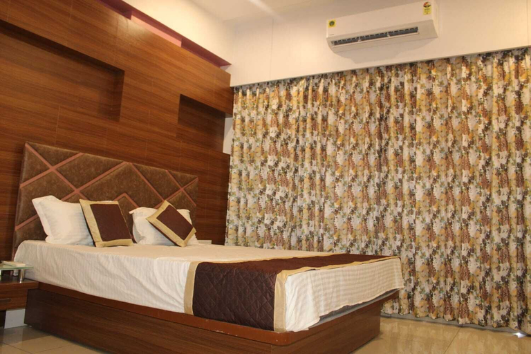 Bedroom 5, Hotel Empire, Valsad