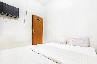 Bed 2, Kartini Populer Guest House RedPartner, Central Jakarta