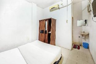 Bed 5, Kartini Populer Guest House RedPartner, Central Jakarta