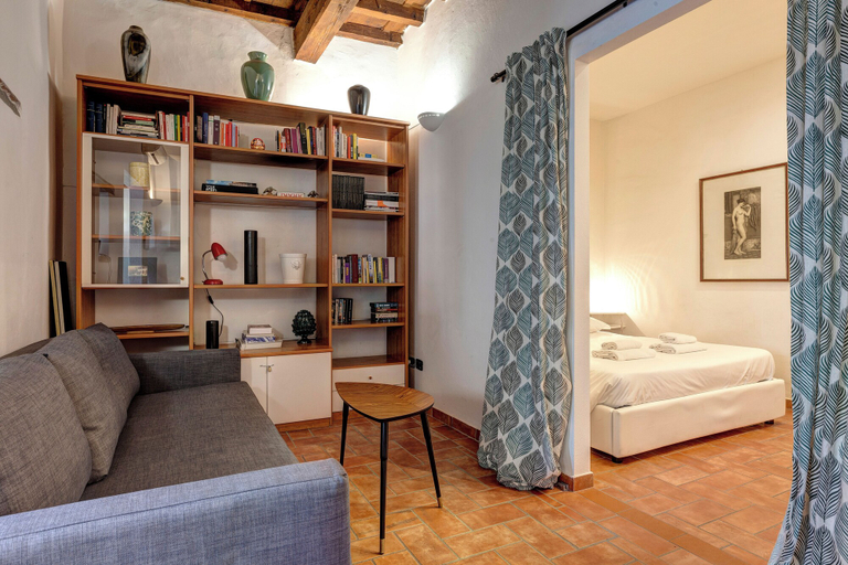 Living area 3, Stufa Apartment by Mamo Florence, Florence