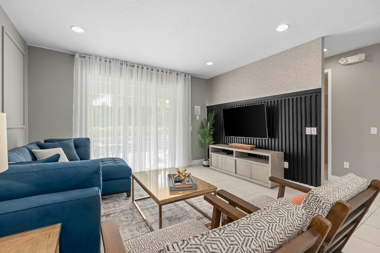 Living area 4, Dog-friendly Getaway With Private Pool + Spa, Putting Green, Patio, & Game Room, Osceola