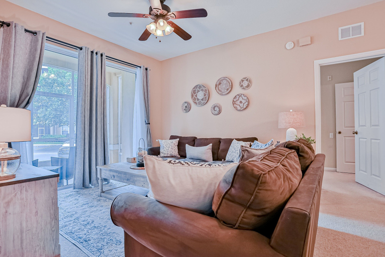 Living area 2, Friendly Condo With Pool and hot tub Access, Wifi, Central AC, and Private W/D, Osceola