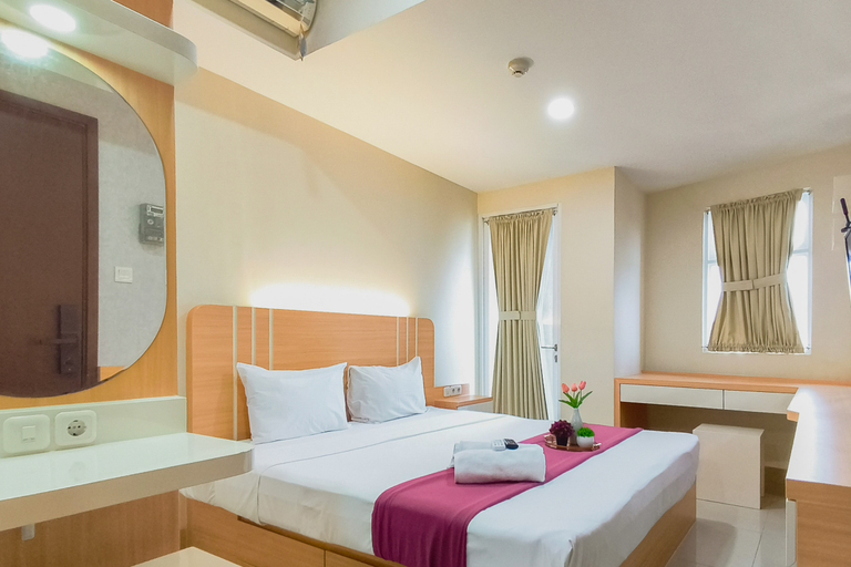 Bedroom 4, Comfy Modern Look Studio Room at Apartment Grand Dharmahusada Lagoon By Travelio, Surabaya