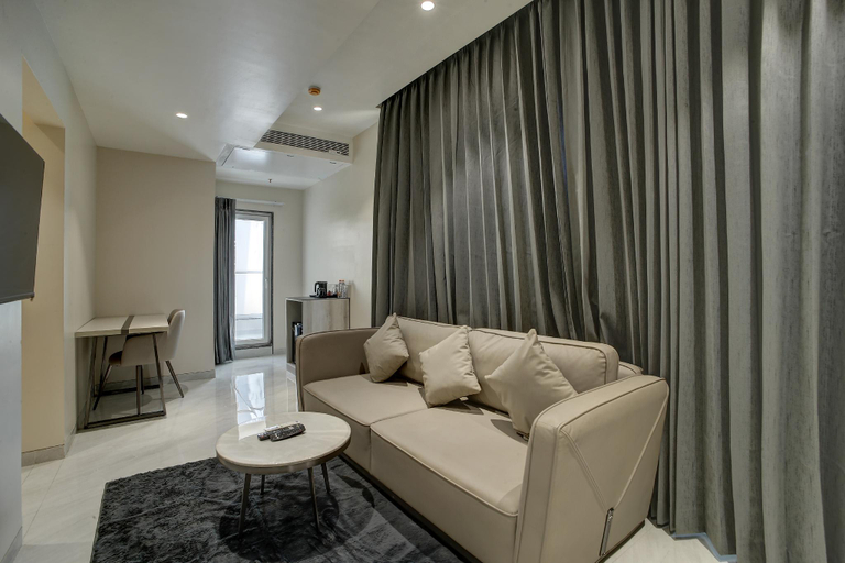 Separate living room 4, StayBird Capital- Business Hotel, Pune