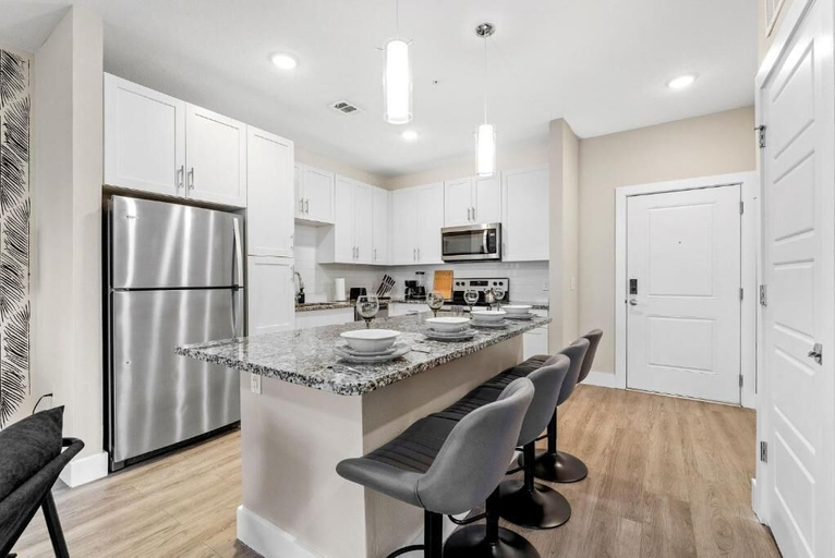 Private kitchen 3, Pinnacle Apartments W Amenties by Heavenly Homes, Orange