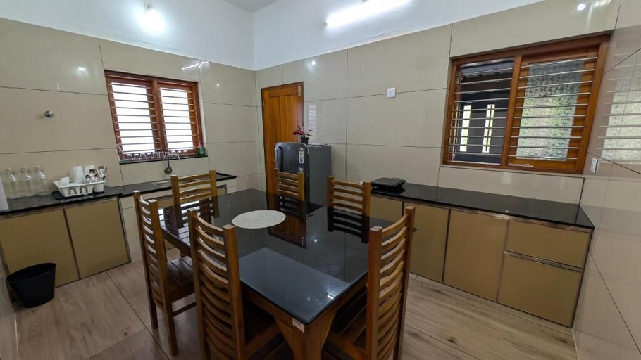 Shared kitchen facilities, Grand Beach Villa Payyambalam, Kannur
