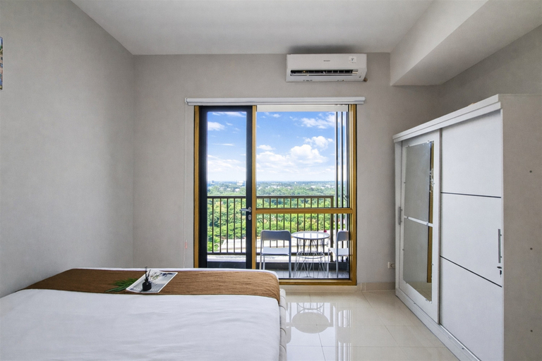 Bedroom 2, Comfortable Classic Beige 1BR at Apartment The Ayoma By Travelio, Tangerang Selatan