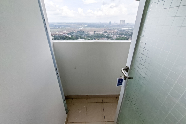 Balcony, Comfy Studio With City View At Cisauk Point Apartment, Tangerang