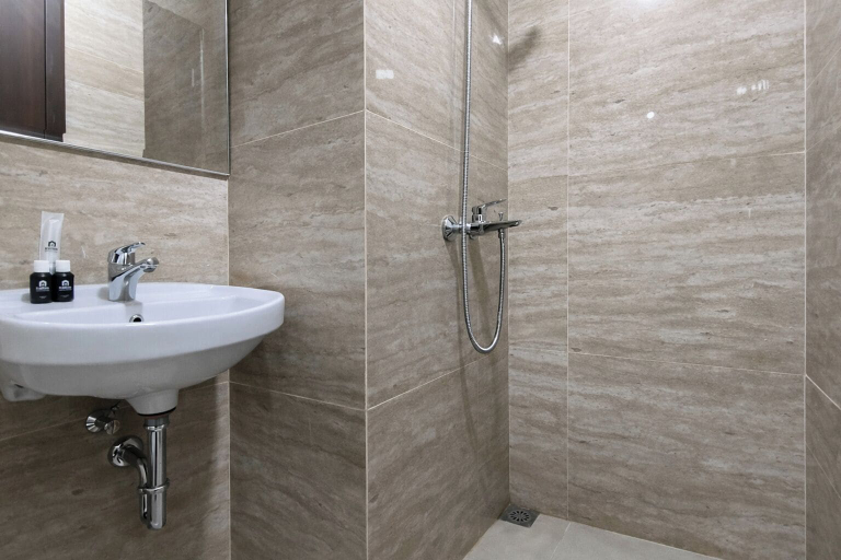 Bathroom 3, Good And Restful Studio With City View At Trans Icon Surabaya Apartment, Surabaya