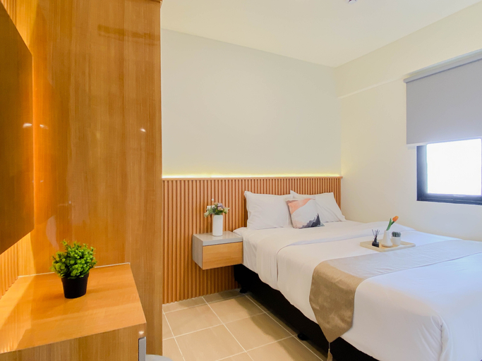 Bedroom 2, Classic and Warm 2BR at Apartment Meikarta District 2 By Travelio, Cikarang