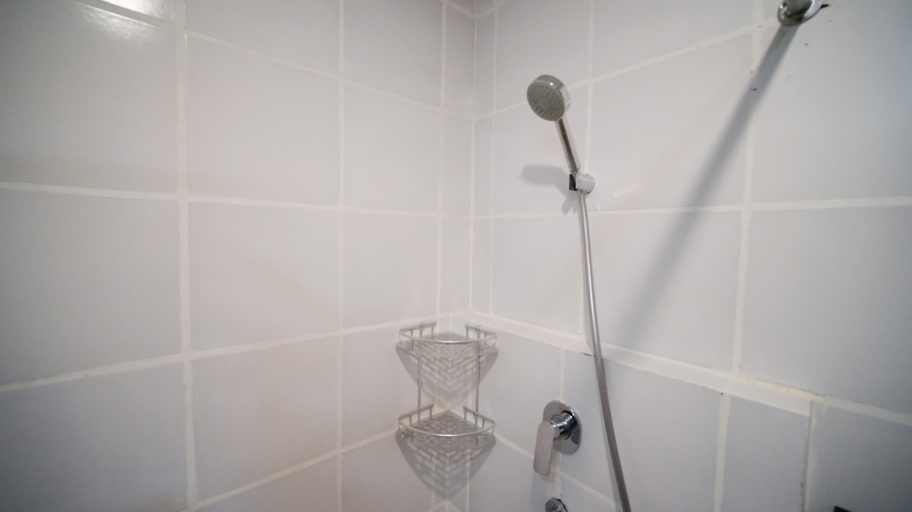 Bathroom 5, Good Choice and Comfy Studio at The City Square Apartment By Travelio, Surabaya