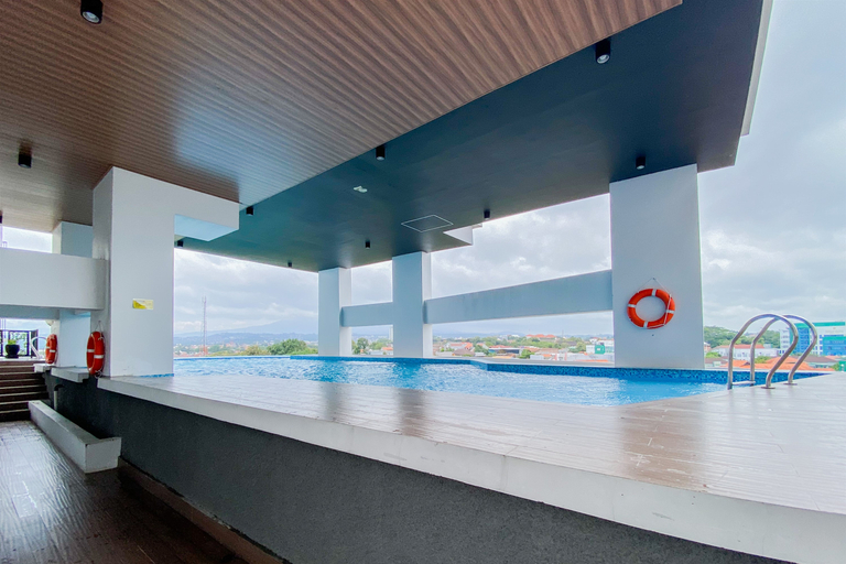 Swimming Pool 4, Good and Practical Studio Room at Apartment The Alton By Travelio, Semarang