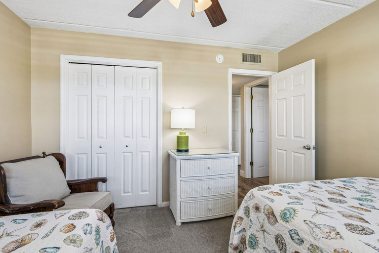 Bedroom 3, Upper Unit Condo Overlooking Both the Ocean Pier and Swimming Pool by RedAwning, Nassau