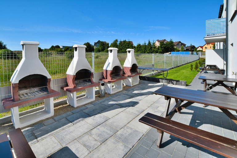 Outdoor dining 3, Comfortable Holiday Homes With a Summer Pool, Sławno