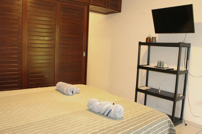 Room 3, Casa ampla com jardim e 3 suítes em Novo Airão, Novo Airão