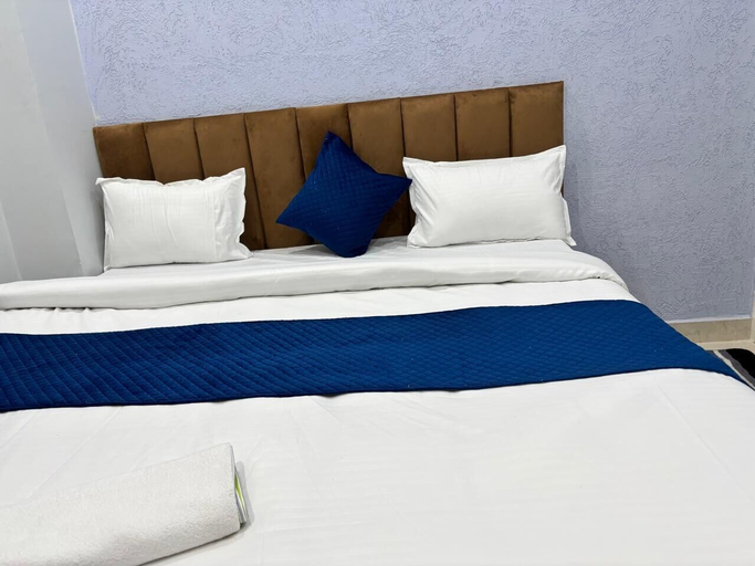 Room 5, Hotel PLC Grand, Varanasi