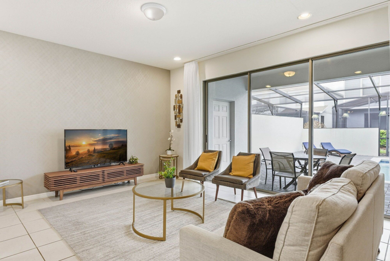 Living area 2, Cozy and Spacious 5BR With Pool Near Disney Parks, Osceola