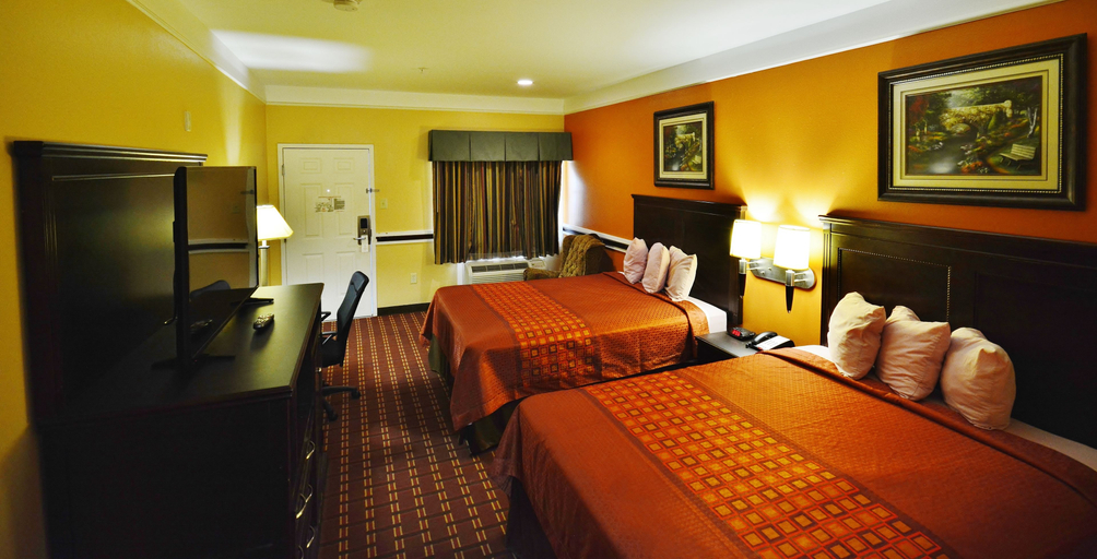 Bedroom, Scottish Inns and Suites Alvin, Brazoria