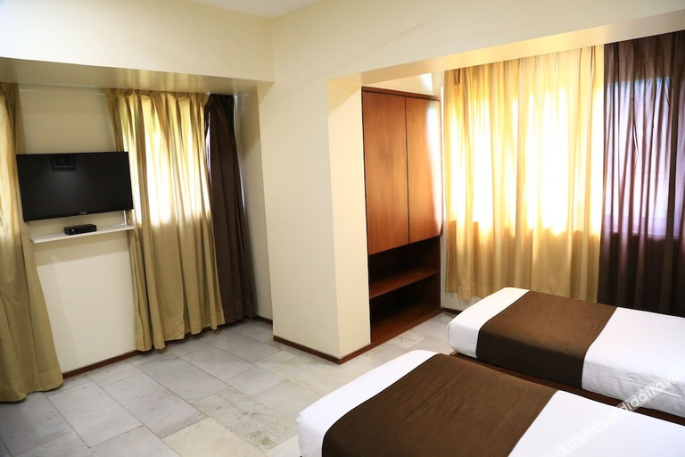 Bedroom 3, Hotel Executive Residency, Pune