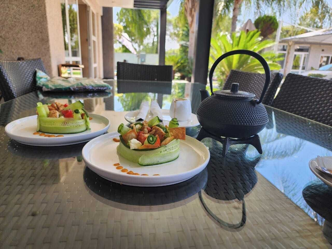 Outdoor dining 2, Cycad Palm Boutique Guesthouse, Gaborone