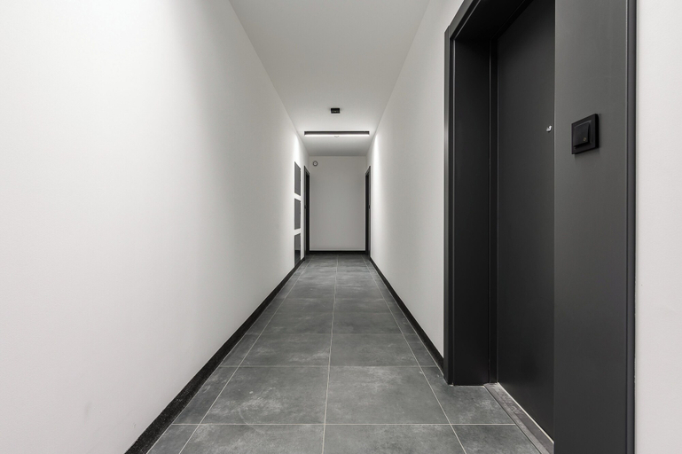 Hallway, Lumina apartment with patio and parking, Łódź
