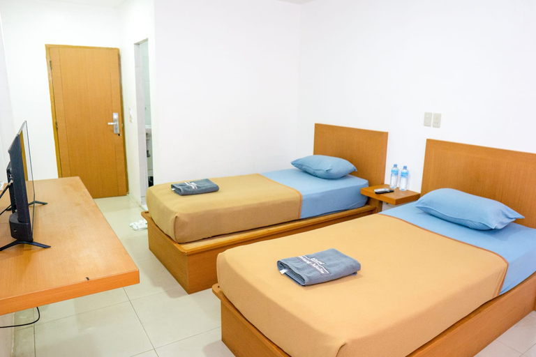 HOTEL BINTANG MULIA - Tap to explore photos