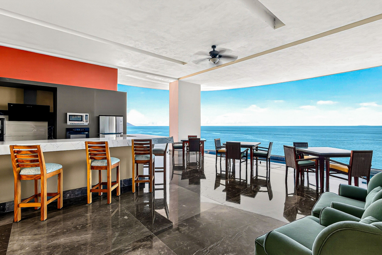 Outdoor dining 5, Modern Condo With Ocean Views, Rooftop Infinity Pool & Central AC, Puerto Vallarta