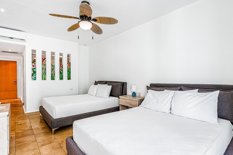 Room 5, Spacious Condo With Near the Beach With Resort-style Pool, Inviting Balcony, Compostela