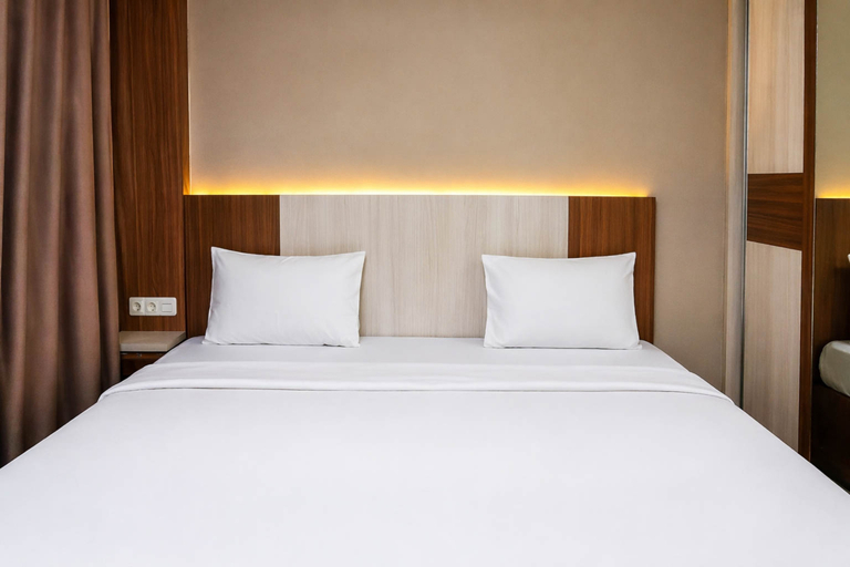 Bedroom 2, 2 Pax Comfy Studio at Tamansari Skylounge Makassar Apartment By Travelio, Makassar