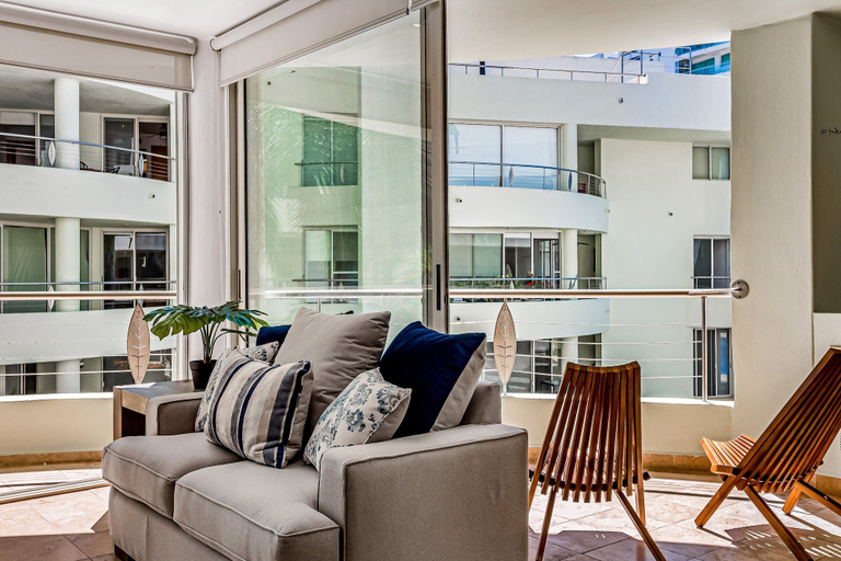 Living area 3, Nitta Condo # 104 Chic, Pool-view Condo With Furnished Balcony - Steps to Beach, Compostela