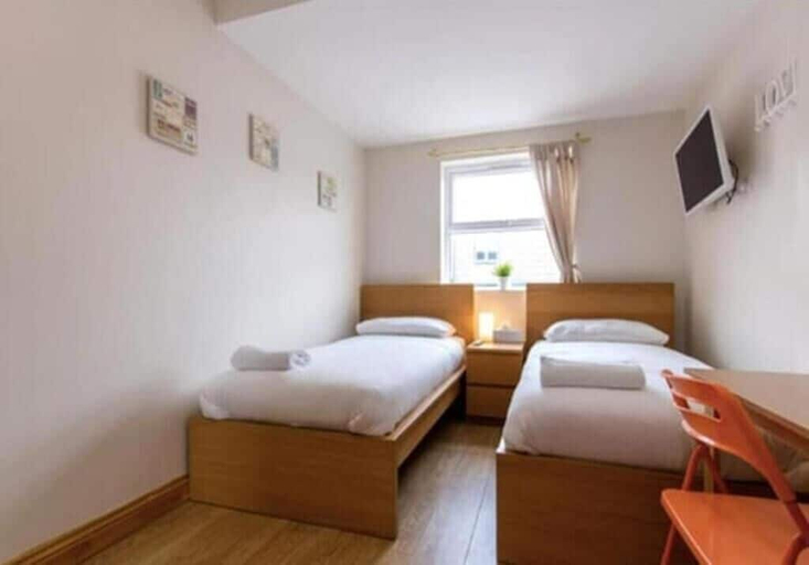 Bedroom 3, Portobello Rooms by PrimeCityHosts, London