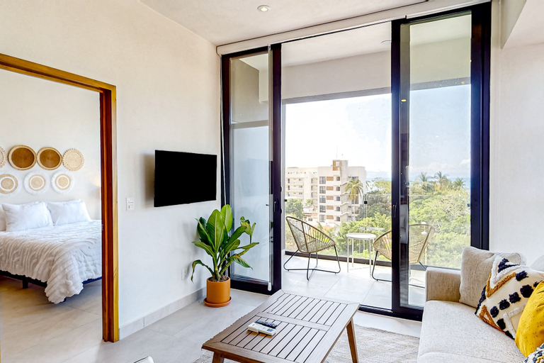 Living area 4, Ocean-view Condo With Infinity Pool, Rooftop Lounge, & Private Balcony, Compostela