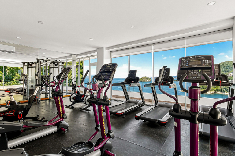 Fitness facility 4, Modern Condo With Ocean Views, Rooftop Infinity Pool & Central AC, Puerto Vallarta