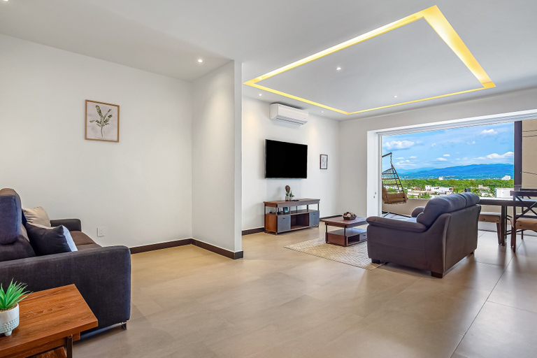 Living area 2, Enchanting & Modern Beach Retreat With Pool, Gym, & Breathtaking Balcony Views, Puerto Vallarta