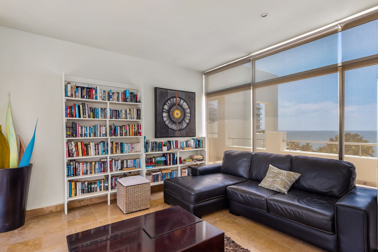 Living area 3, Stylish Beach Condo With Balcony View, Pool, Wifi & Central AC, Compostela