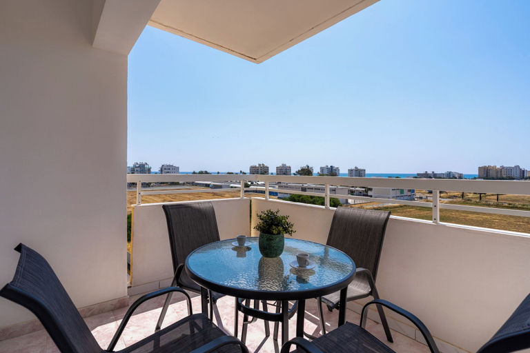 Outdoor dining, Sunny 2-BR Apt. & Balcony in Mackenzie, Larnaca