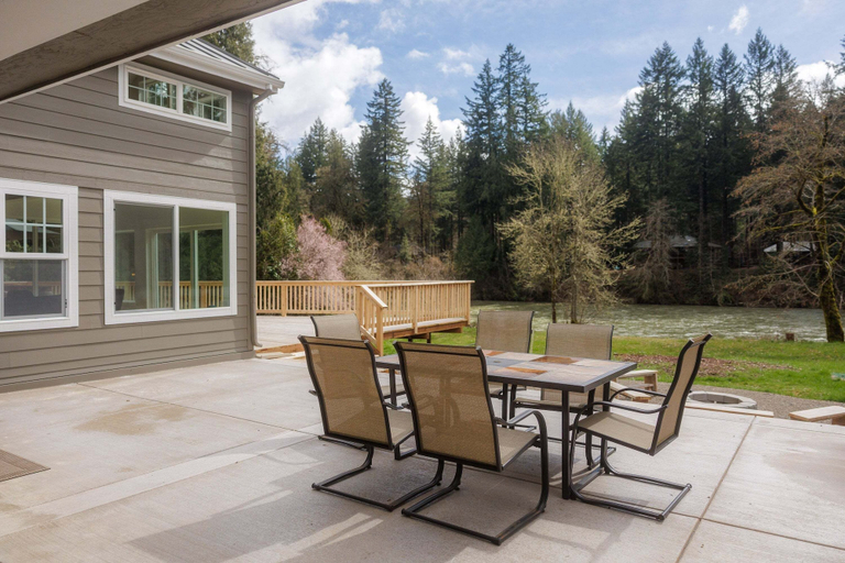 Outdoor dining 2, River's Rest - Waterfront Views, Hot Tub, Grill & Fire Pit 3 Bedroom Home, Lane