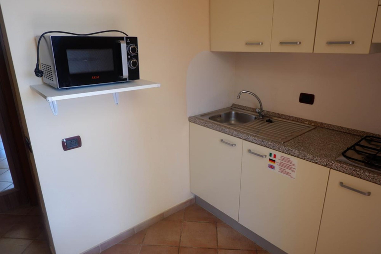 Room 5, Residence I Tusci Studio 4p Half Board, Grosseto