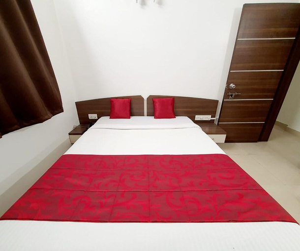 Bedroom 5, Bhooshan Hotel Airport Road, Pune