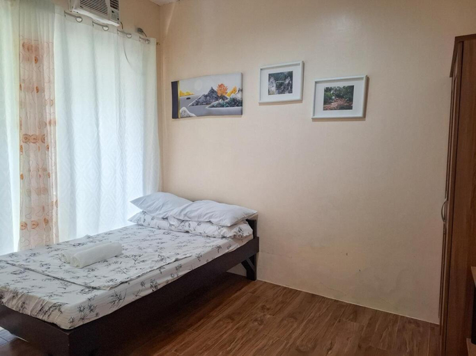Bedroom 3, Balcon: Your Cozy Camotes Island Escape, San Francisco