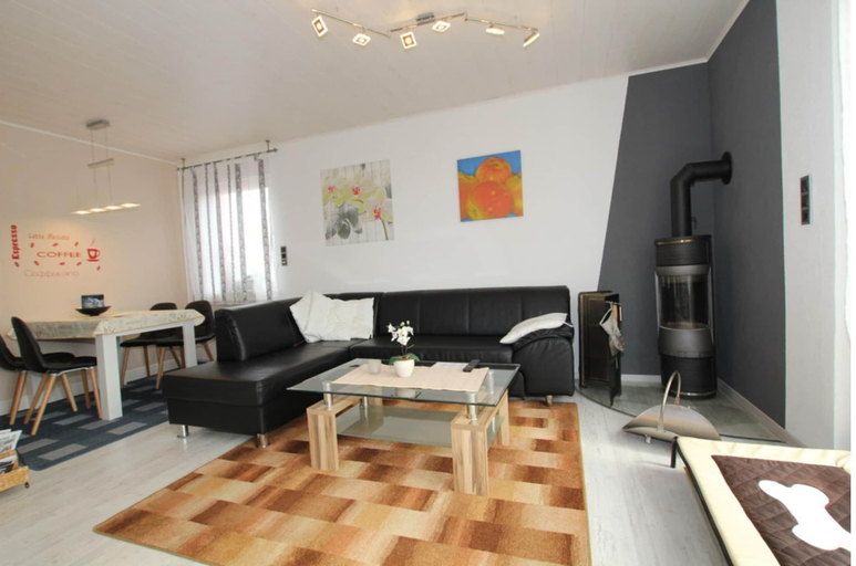 Living room 3, Bungalow mit Kamin in Dornumersiel, Aurich