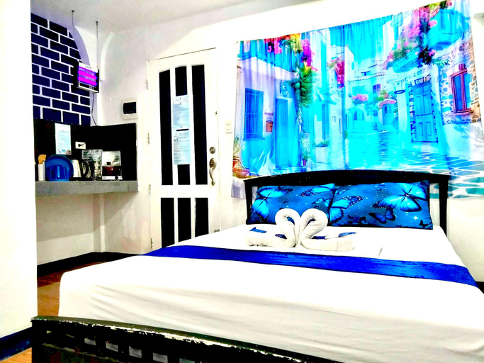 Bedroom 4, DMI Hotels and Apartments with Newly opened Lava Stone Pool by Reddoorz, Tabaco City
